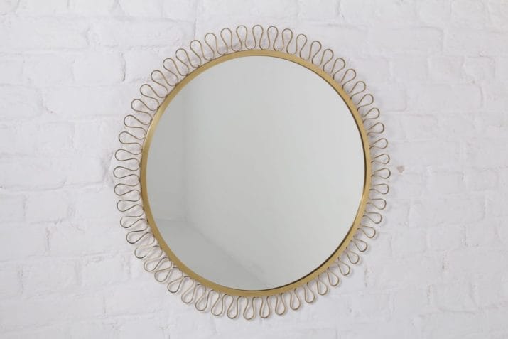 Large round mirror in solid brass in the Josef Frank style