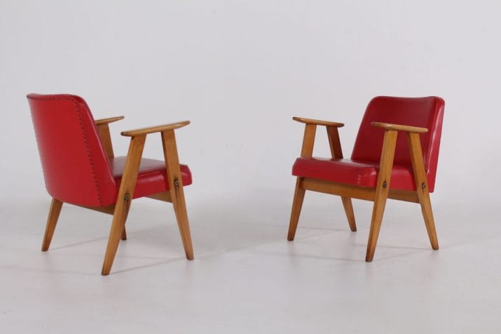 Pair of armchairs with compass legs
