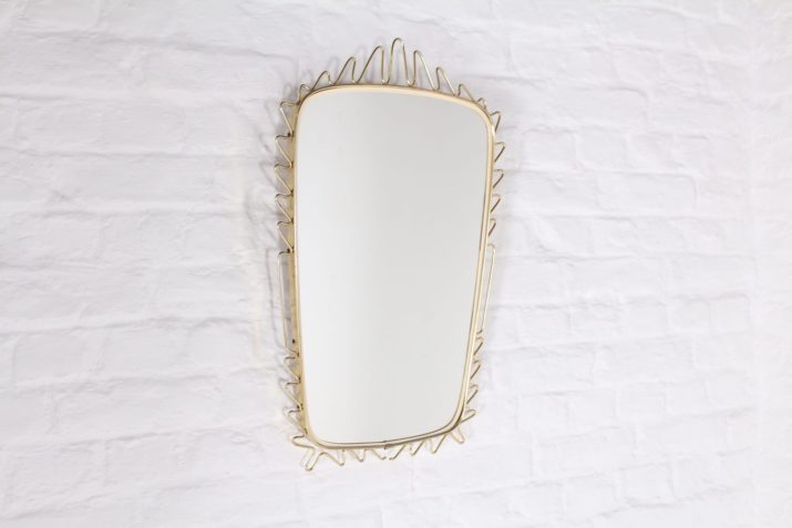 Sunburst" mirror in brass