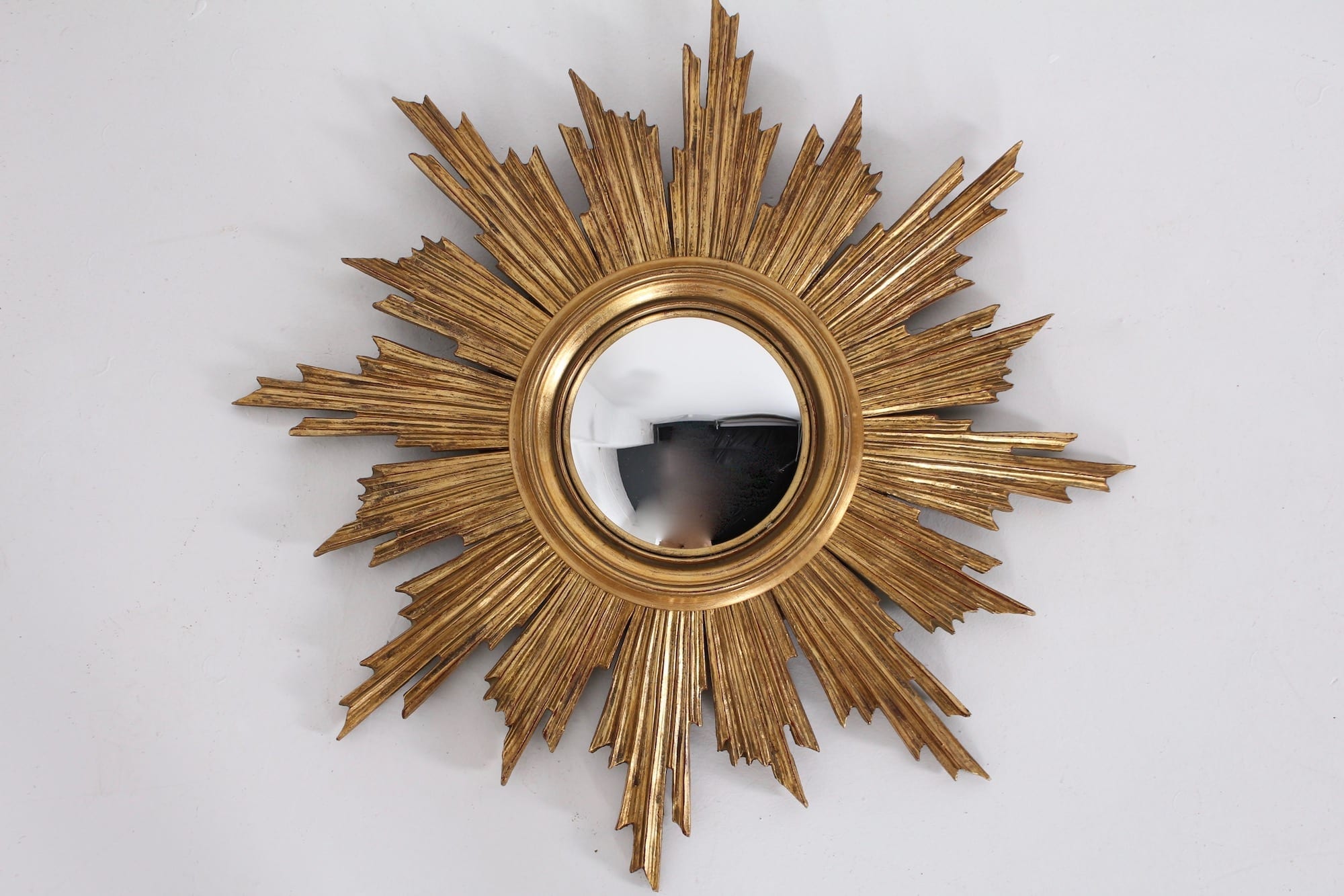 Miroir soleil oeil de sorcière en bois doré - Meubles Vintage