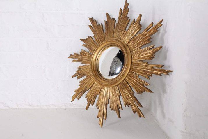 Witch's eye sun mirror made of gilded wood