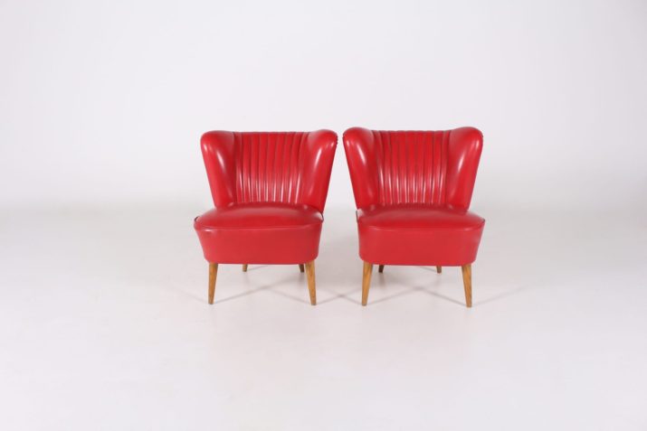 Paar rode 'Cocktail' fauteuils.