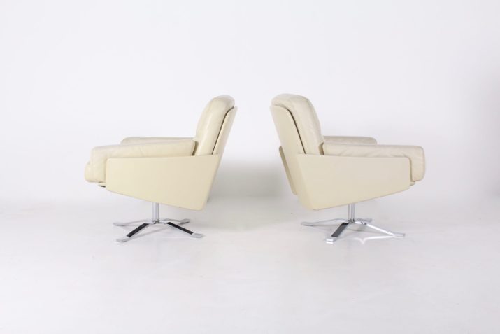Pair of leather swivel chairs