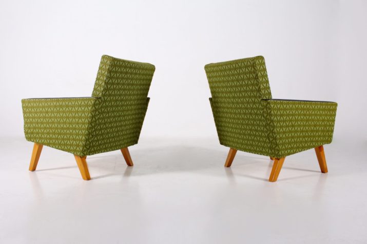 Pair of club chairs in green fabric