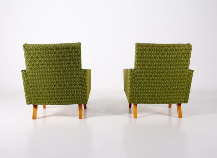 Pair of club chairs in green fabric