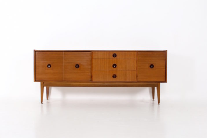 Walnut sideboard with lighted bar.