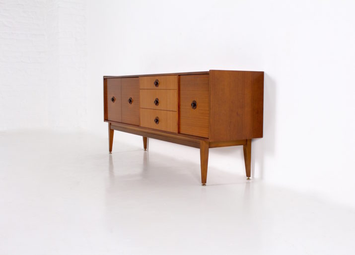 Walnut sideboard with lighted bar.