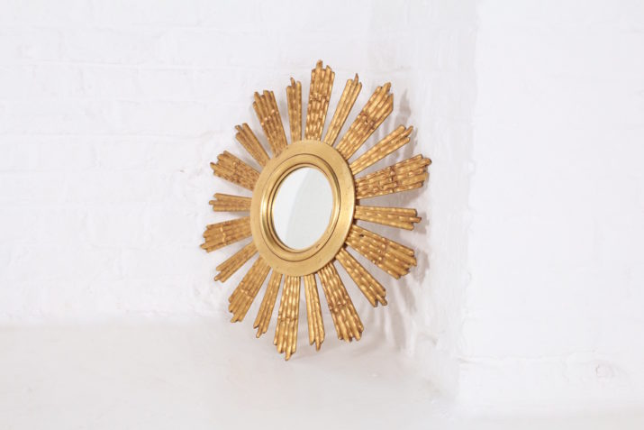 Sunshine mirror made of golden wood