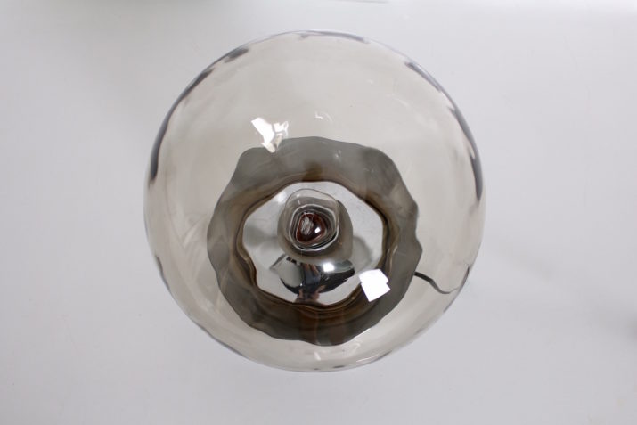 Globe lamp uit de ruimtevaart in amber glas