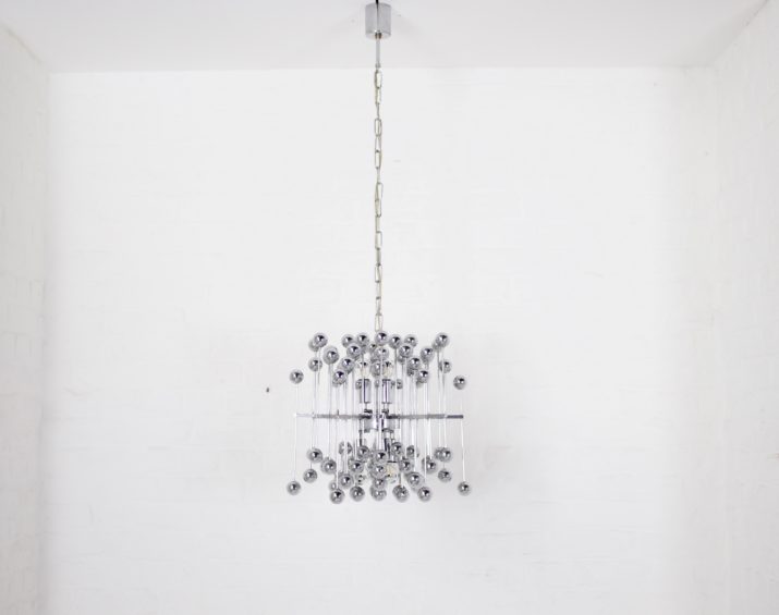 Kinetic atomic suspension chandelier.