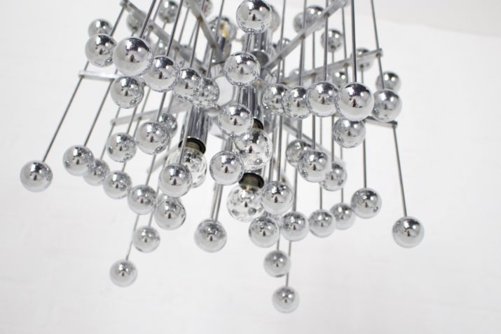Kinetic atomic suspension chandelier.