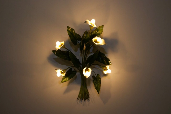 Sconce light with Arums / Callas.