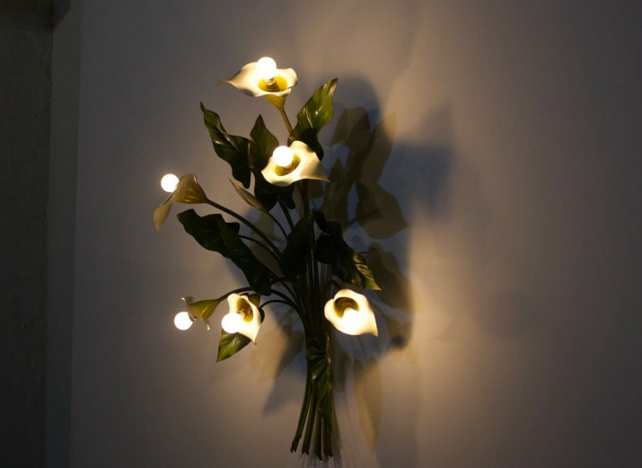 Sconce light with Arums / Callas.