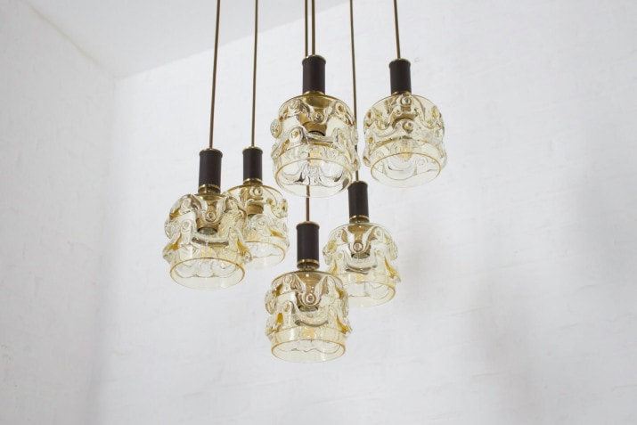 Cascade chandelier in honeyed glass .