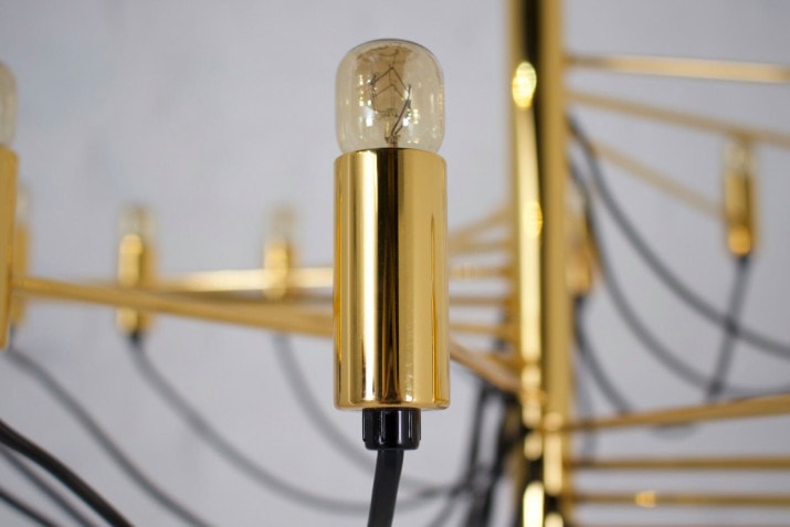 Sarfatti-style brass spiral chandelier.