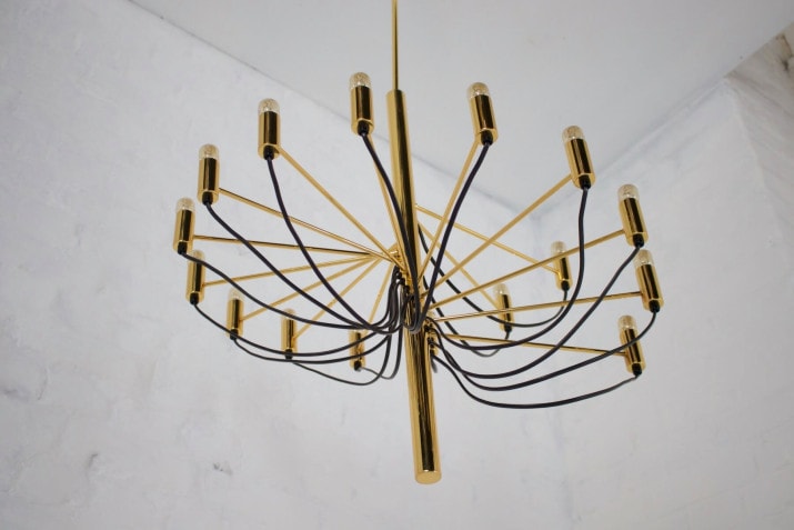 Sarfatti-style brass spiral chandelier.