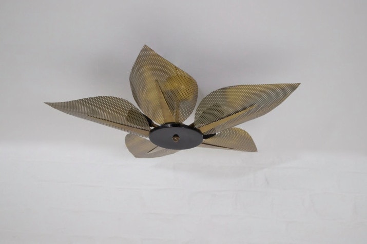 Ceiling light with perforated brass petals.