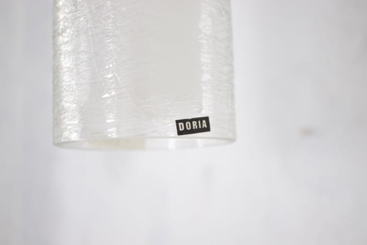 Doria suspension fixtures in frosted glass.
