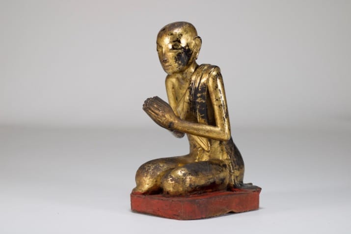 Burmese adoring figure in gilded wood.